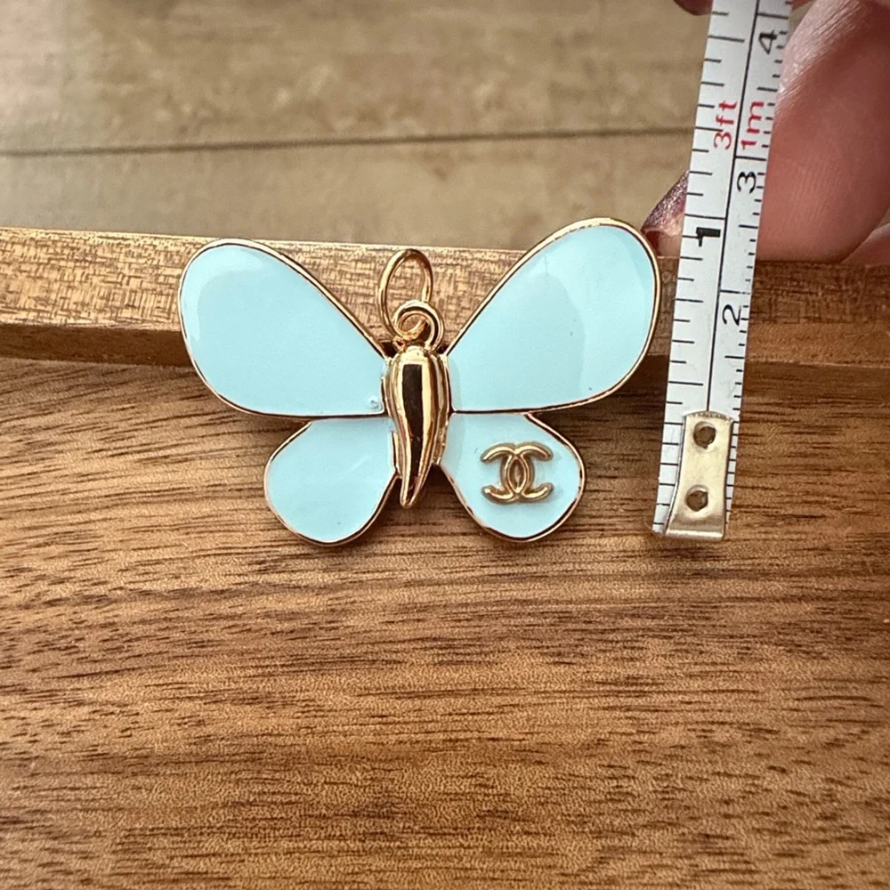 CHANEL Gold and Light Blue Butterfly Zipper Pull - Picture 5 of 9
